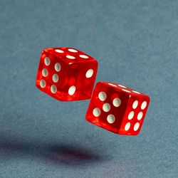 Two red dice with numerical values lie in a chaotic order.