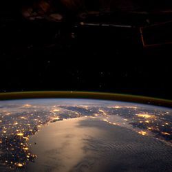 European lights seen by astronaut André Kuipers from ISS. Portugal is to the right of the image, while Paris is the glowing light on the left.