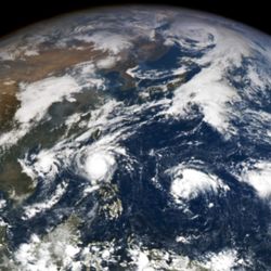 Four typhoons captures on satellite data shown on a image of the Earth over the Philippines