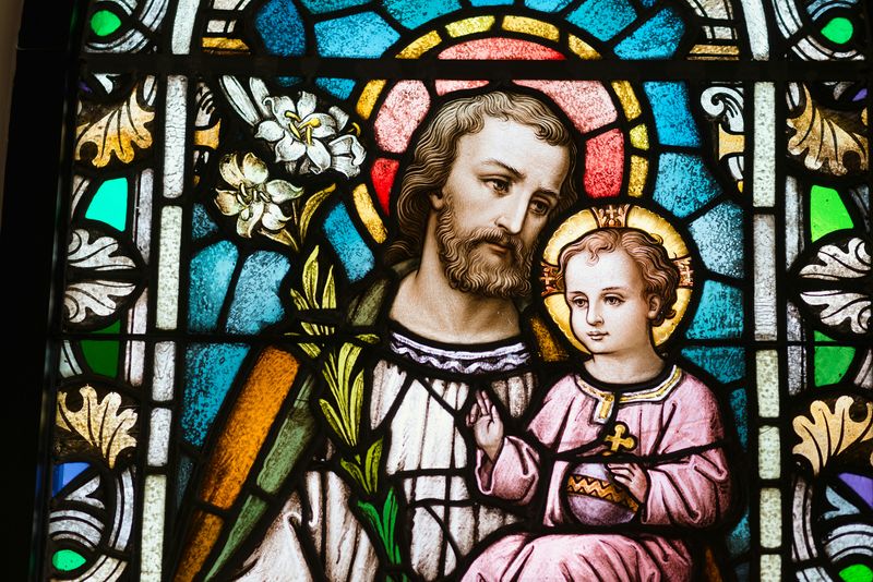 Saint Joseph depicted on a Church's stained glass window.
