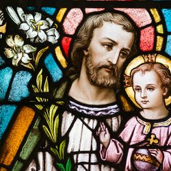 Saint Joseph depicted on a Church's stained glass window.