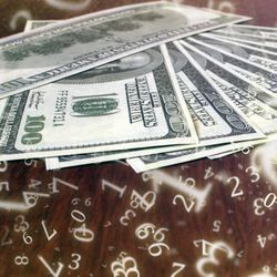 100-dollar bills laid out on a table with lots of glowing numbers floating about over the top, some upside down