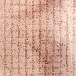 A typical page from the Archimedes Palimpsest. The text of the prayer book is seen from top to bottom, the original Archimedes manuscript is seen as fainter text below it running from left to right