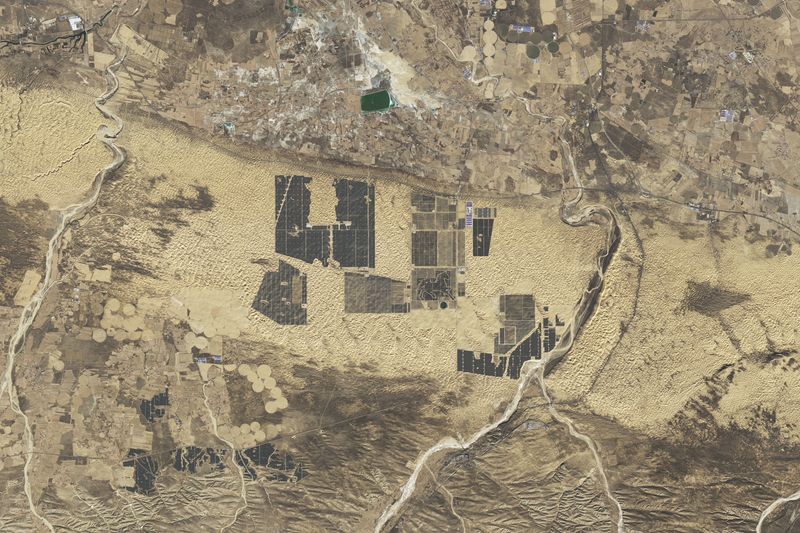 satellite image of solar panels installed in the Kubuqi Desert