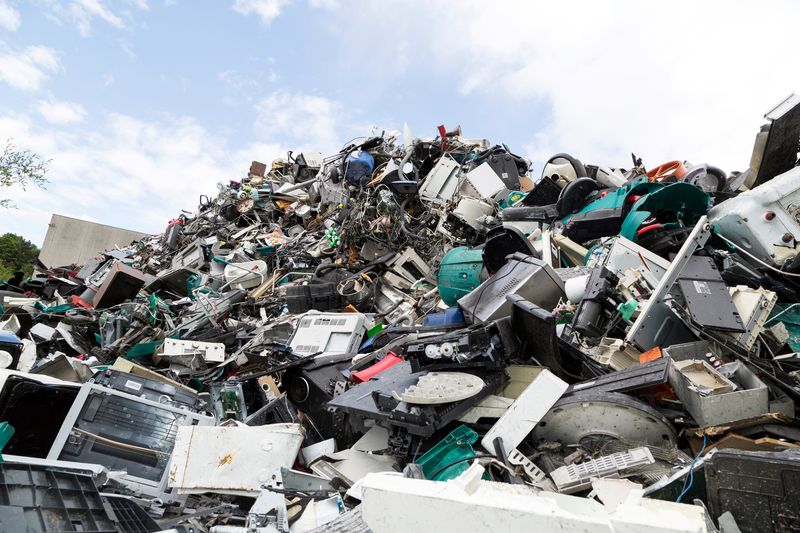 a large pile of electronic waste