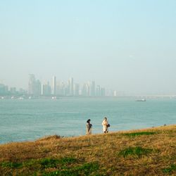 A Bridge in Wuhan, China, crosses over the Yangtze River near cities