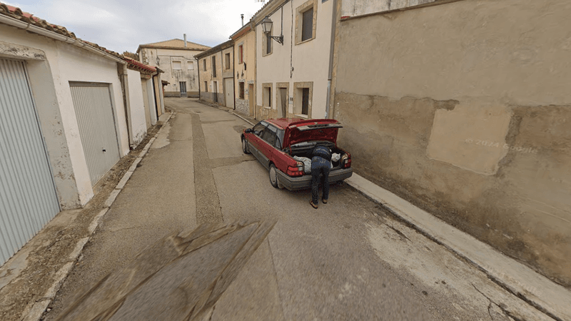 Google street view shows a potential murder victim being loaded into the back of a car.