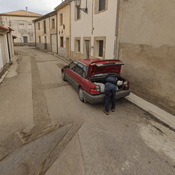 Google street view shows a potential murder victim being loaded into the back of a car.