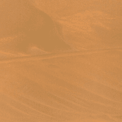 NASA’s Ingenuity Mars Helicopter, right, stands near the apex of a sand ripple 