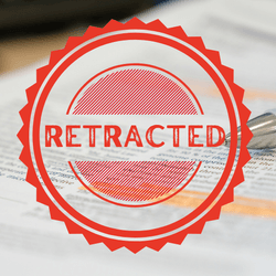 image of scientific paper with a pen lying on the top, with a red stamp saying "retracted" superimposed on top