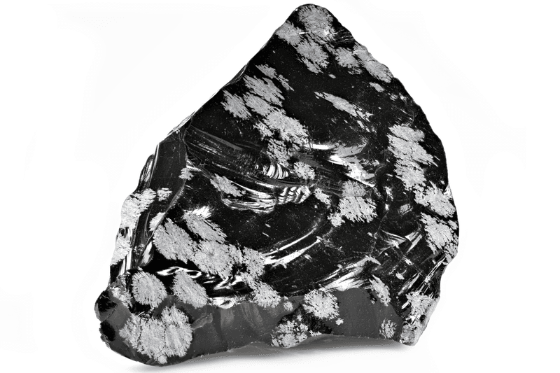 Snowflake Obsidian. a black rock with white snowflake pattersn on. 
