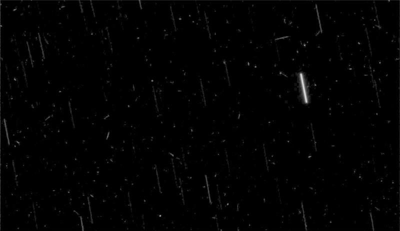 Star trails photographed by the Spirit Rover with dots from cosmic rays. A Martian pole star would be a brighter dot on an image like this, but does it have one?