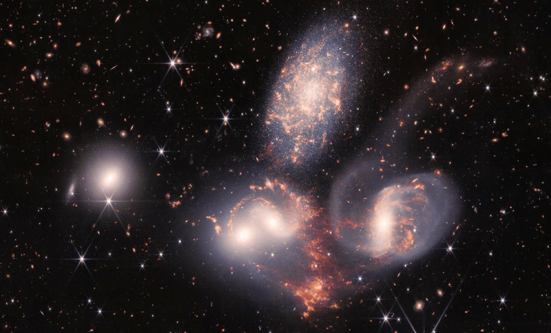 The JWST made Stephan's Quintet one of its five original images. The collision between one of the galaxies and three others is part of the reason the galaxies are so bright.