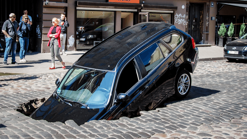 a car has fallen into a sinkhole, where does it go?