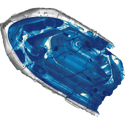 Microscope image of a small, blue zircon crystal found in Jack Hills, Australia, confirmed to be the oldest bit of the Earth's crust.